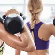 women working out with kettlebells