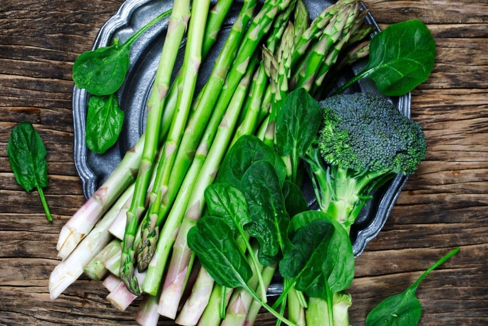 Folate rich green vegetables including asparagus and spinach